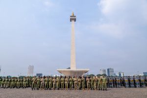Photo By Senior Master Sgt. Mysti Bicoy | Indonesian military leaders, U.S. Pacific Command representatives and members of the Hawaiʻi National Guard delegation pose for a group photo in front of the National Monument (Monas) following a static display of riot control equipment (PHH) hosted by Kodam Jaya/Jayakarta in Jakarta, Indonesia, June 11, 2026. The demonstration showcased Indonesian military personnel, specialized equipment and operational capabilities supporting public order, force protection and emergency response missions. The engagement provided an opportunity for professional military exchange and strengthened relationships among Indonesian, U.S. Pacific Command and Hawaiʻi National Guard leaders. The event was part of a week-long series of activities commemorating the 20th anniversary of the Hawaiʻi–Indonesia State Partnership Program, which promotes military partnerships, professional exchanges and regional security cooperation between Hawaiʻi and Indonesia. (U.S. Air National Guard photo by Senior Master Sgt. Mysti Bicoy)