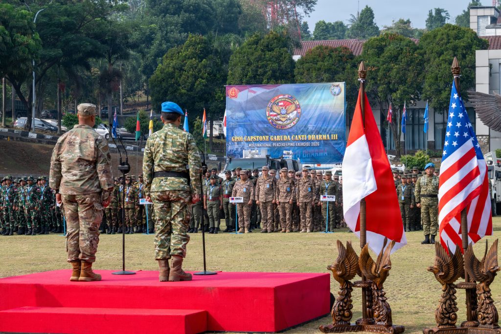 Brig. Gen. Phillip L. Mallory (left), Hawaiʻi National Guard deputy adjutant general, stands alongside Maj. Gen. Iwan Bambang S., S.I.P., commander of the Indonesian Armed Forces Peacekeeping Center (PMPP TNI), during the opening ceremony of Exercise Garuda Canti Dharma III at the Indonesian Peacekeeping Training Center, July 20, 2026. The exercise brings together more than 700 military members and civilians from 22 nations to strengthen interoperability and prepare participants for future United Nations peacekeeping missions. Garuda Canti Dharma III marks the final iteration funded through the Global Peace Operations Initiative. (U.S. National Guard photo by Senior Master Sgt. Mysti Bicoy)