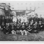 National Guard Naval Militia - Hawaii Naval Militiamen Serving on the USS. ST. Louis - Former Hawaii Naval Militiamen serving in USS St, Louis entertained at a picnic party by Mrs. Rush (Former Jennie Hare), wife of Capt. William R. Rush, USN, Cmdt of Boston Navy Yard during WWI. Center (L to R) lt. Com. S.W. King, Mrs. Rush, Lt. (J.g.) J.A. Mckeown, Ensign H. W. Engel