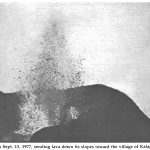 Kilauea Volcano stirs into action on Sept. 13, 1977, sending lava down its slopes toward the village of Kalapana.