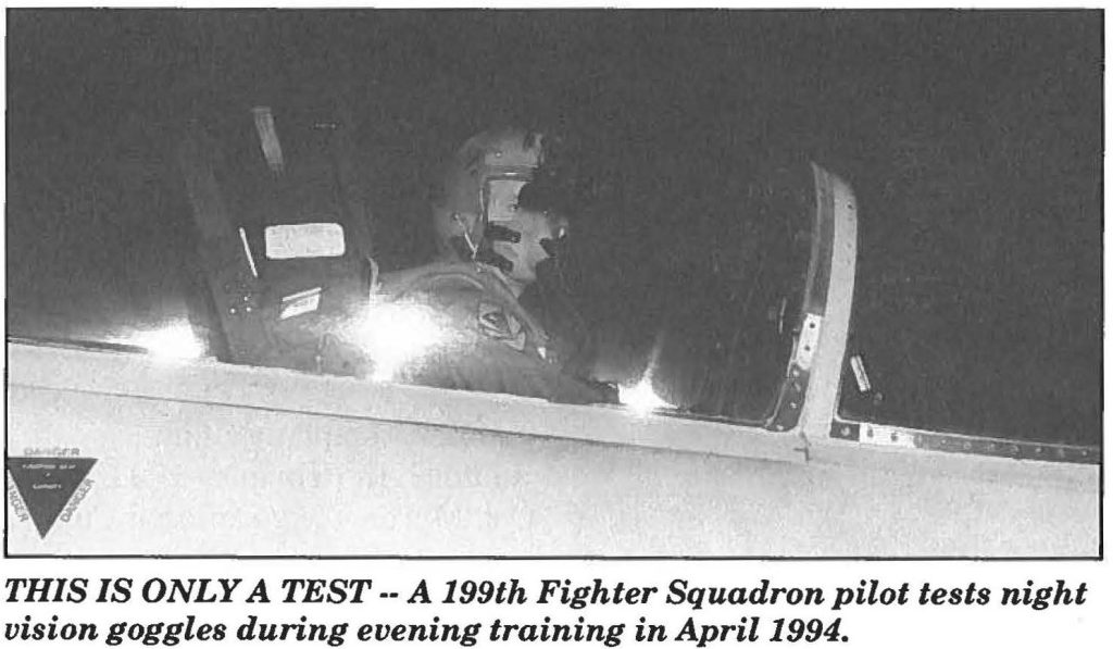 THIS IS ONLY A TEST -- A 199th Fighter Squadron pilot tests night vision goggles during evening training in April 1994.