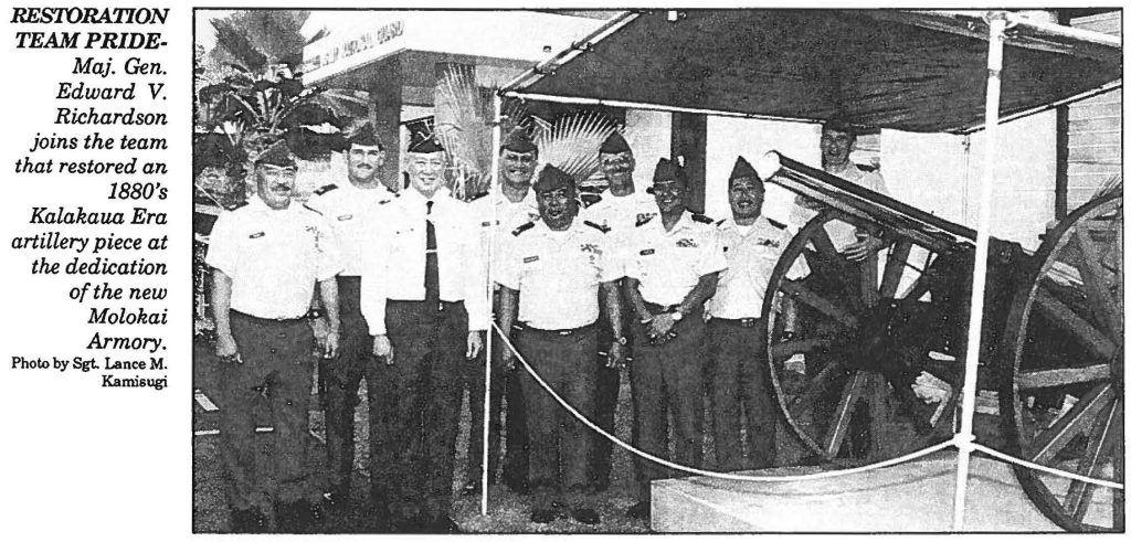 RESTORATION TEAM PRIDE Maj. Gen. Edward V. Richardson joins the team that restored an 1880's Kalakaua Era artillery piece at the dedication of the new Molokai Armory. Photo by Sgt. Lance M. Kamisugi