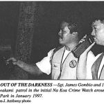 SHINING OUT OF THE DARKNESS -Sgt. James Gombio and 1st Lt. Jeffrey Kawakami patrol in the initial Na Koa Crime Watch around Kapiolani Park in January 1997. Capt. Charles J . Anthony photo