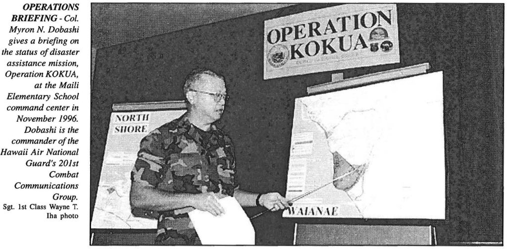 OPERATIONS BRIEFING - Col. Myron N. Dobashi gives a briefing on the status of disaster assistance mission, Operation KOKUA, at the Maili Elementary School command center in November 1996. Dobashi is the commander of the Hawaii Air National Guard's 201st Combat Communications Group. Sgt. 1st Class Wayne T. Iha photo