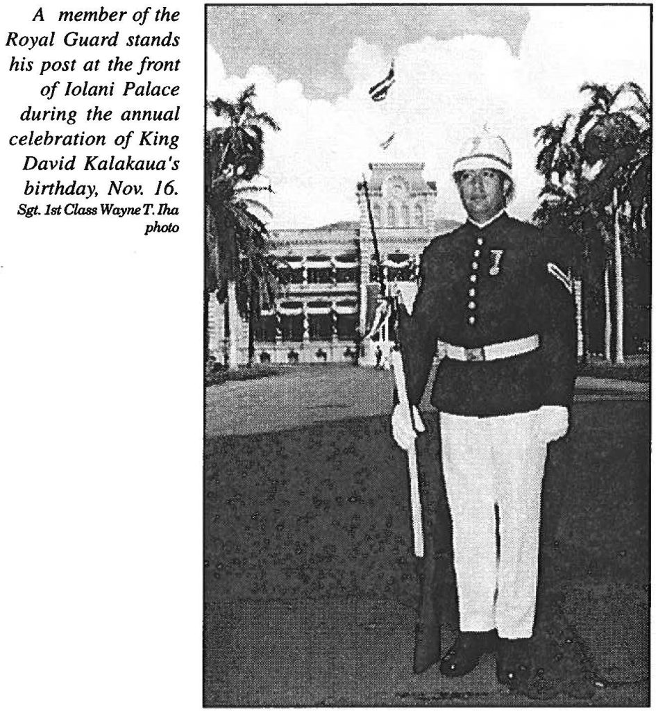 A member of the Royal Guard stands his post at the front of Iolani Palace during the annual celebration of King David Kalakaua 's birthday, Nov. 16. Sgt.1st Class Wayne T. Iha photo