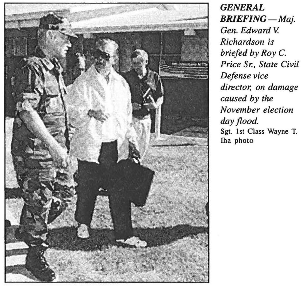 GENERAL BRIEFING - Maj. Gen. Edward V. Richardson is briefed by Roy C. Price Sr., State Civil Defense vice director; on damage caused by the November election day flood. Sgt. 1st Class Wayne T. Iha photo