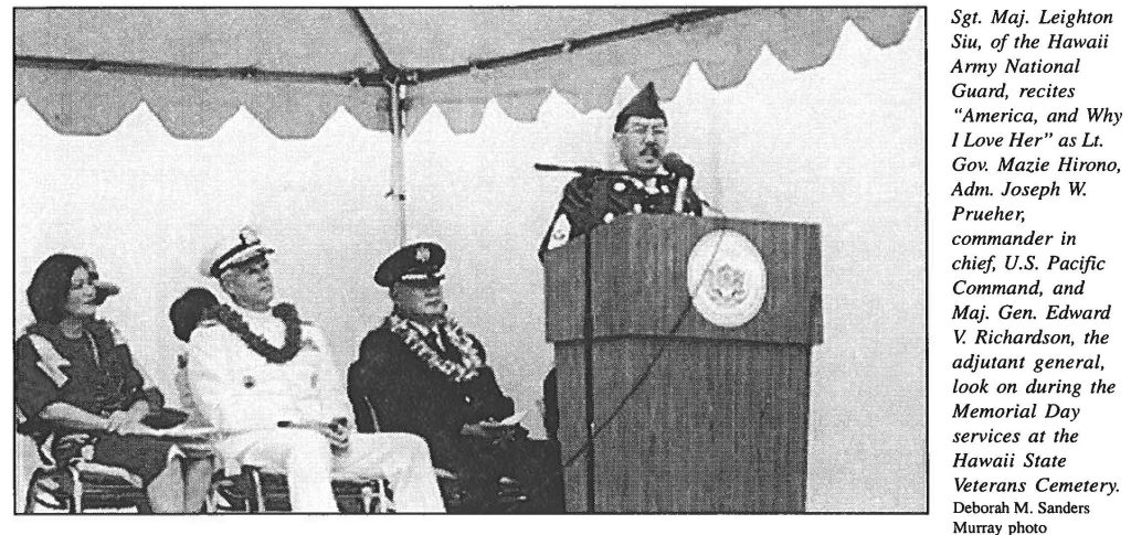 Sgt. Maj. Leighton Siu, of the Hawaii Army National Guard, recites "America, and Why I Love Her" as Lt. Gov. Mazie Hirano, Adm. Joseph W. Prueher, commander in chief, U.S. Pacific Command, and Maj. Gen. Edward V. Richardson, the adjutant general, look on during the Memorial Day services at the Hawaii State Veterans Cemetery. Deborah M. Sanders Murray photo