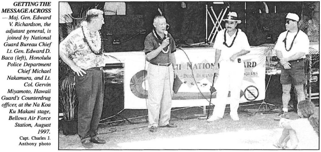 GETTING THE MESSAGE ACROSS - Maj. Gen. Edward V. Richardson, the adjutant general, is joined by National Guard Bureau Chief Lt. Ge11. Edward D. Baca (left), Honolulu Police Department Chief Michael Nakamura, and 11. Col. Gervin Miyamoto, Hawaii Guard's Counterdrug officer, at the Na Koa Ku Makani stage, Bellows Air Force Station, August 1997. Capt. Charles J. Anthony photo