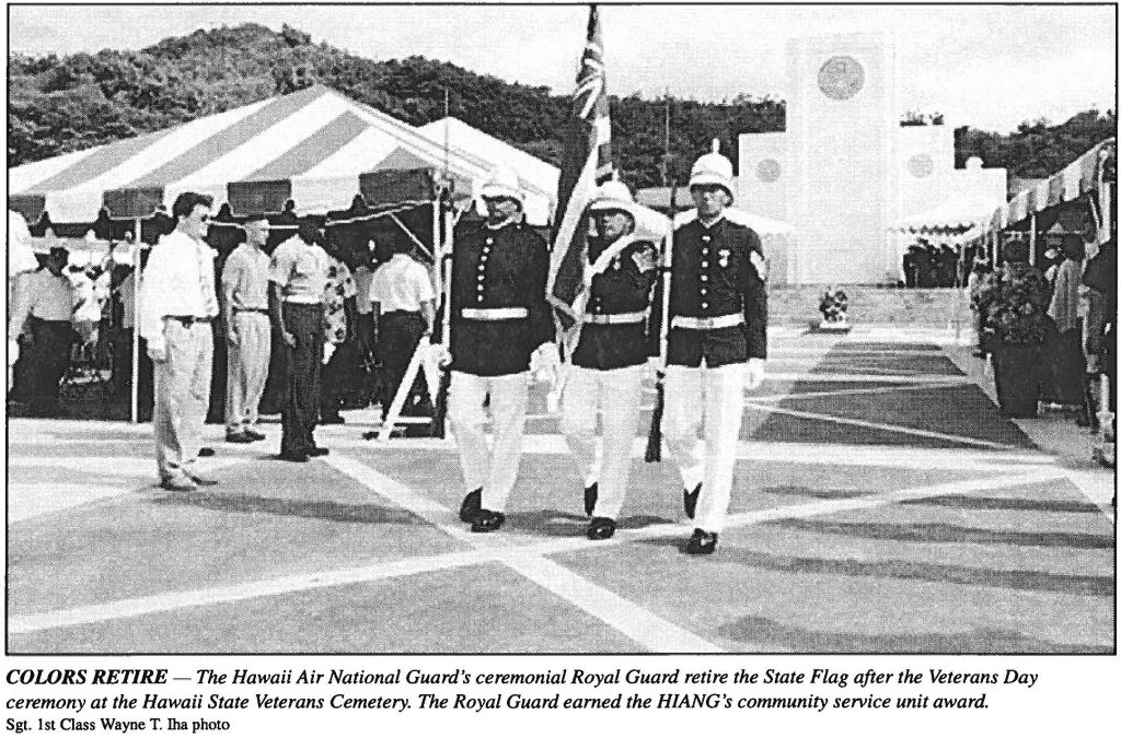 COLORS RETIRE - The Hawaii Air National Guard's ceremonial Royal Guard retire the State Flag after the Veterans Day ceremony at the Hawaii State Veterans Cemetery. The Royal Guard earned the HIANG's community service unit award. Sgt. 1st Class Wayne T. Iha photo