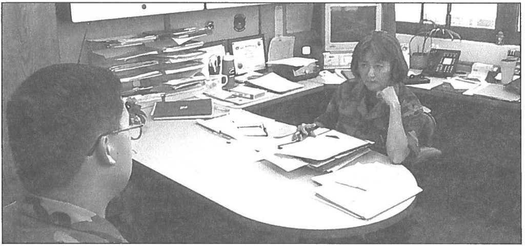 PAY-CHECK Chief Master Sgt. Iris T. Kabazawa, the Hawaii Air National Guard’s personnel superintendent, reviews the personnel records for accuracy and currency. 2nd Lt. Vincent Maloney-Cui photo