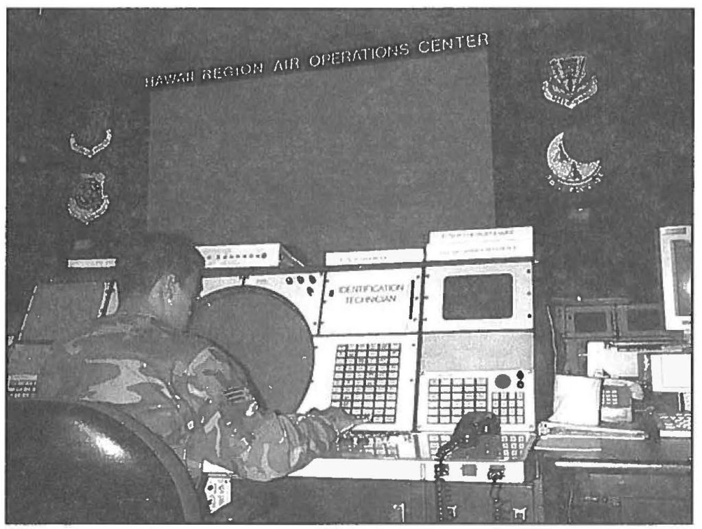 SKIES ARE SAFE - A surveillance technician with the 169th Aircraft Control & Warning Squadron, reviews his data entry codes at the Hawaii Region Air Operations Center at Wheeler Army Airfield. Sgt. 1st Class Stephen M Lum photo