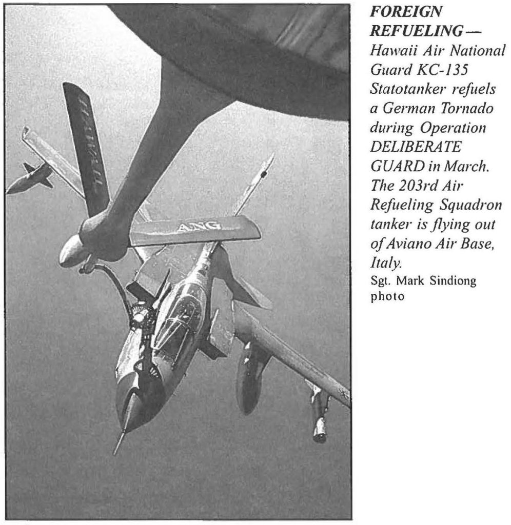 FOREIGN REFUELING Hawaii Air National Guard KC-135 Statotanker refuels a German Tornado during Operation DELIBERATE GUARD in March. The 203rd Air Refueling Squadron tanker is flying out of Aviano Air Base, Italy. Sgt. Mark Sindiong photo