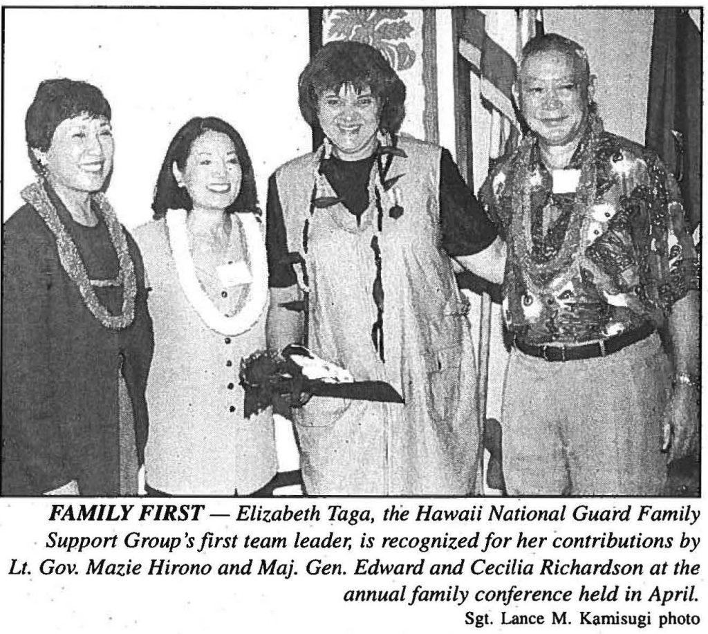 FAMILY FIRST - Elizabeth Taga, the Hawaii National Guard Family Support Group's first team leader, is recognized for her contributions by Lt. Gov. Mazie Hirono and Maj. Gen. Edward and Cecilia Richardson at the annual family conference held in April. Sgt. Lance M. Kamisugi photo