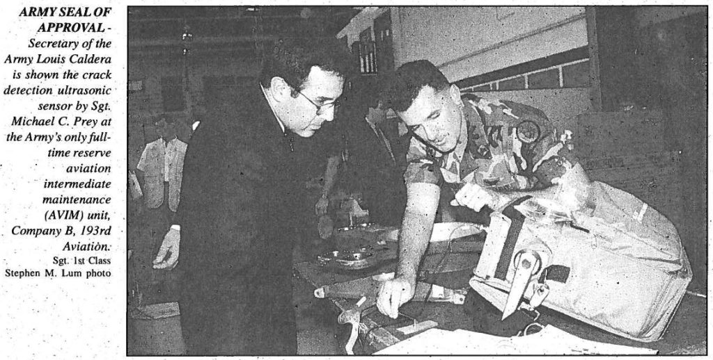 ARMY SEAL OF APPROVAL Secretary of the Army Louis Caldera is shown the crack detection ultrasonic sensor by Sgt. Michael C. Prey at the Army's only fulltime reserve aviation intermediate maintenance (AVIM) unit, Company B, 193rd Aviation Sgt. 1st Class Stephen M. Lum photo