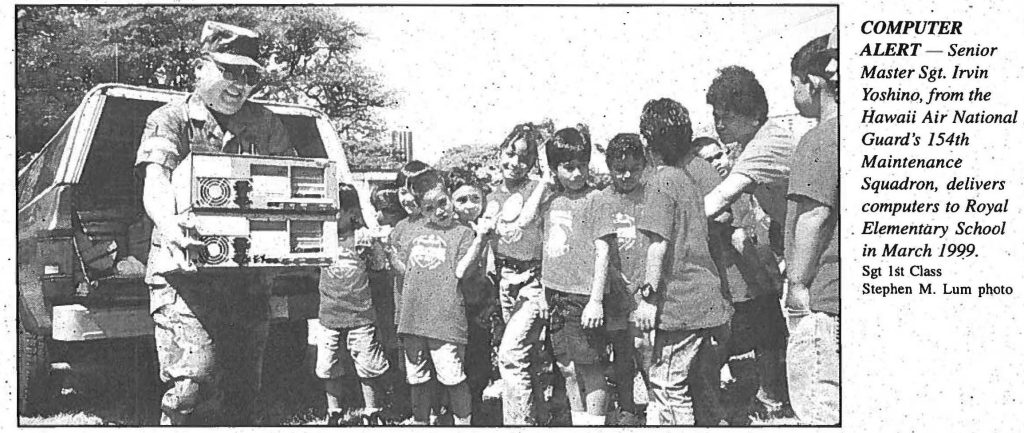 COMPUTER ALERT – Senior Master Sgt. Irvin Yoshino, from the Hawaii Air National Guard's 154th Maintenance Squadron, delivers computers to Royal Elementary School in March 1999. Sgt 1st Class Stephen M. Lum photo