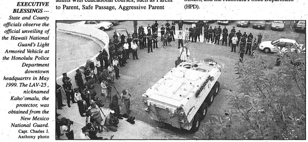 EXECUTIVE BLESSINGS --- State and County officials observe the official unveiling of the Hawaii National Guard's Light Armored Vehicle at the Honolulu Police Department downtown headquarters in May 1999. The LAV-25, nicknamed Kaho 'omalu, the protector, was obtained from the New Mexico National Guard. Capt. Charles J. Anthony photo