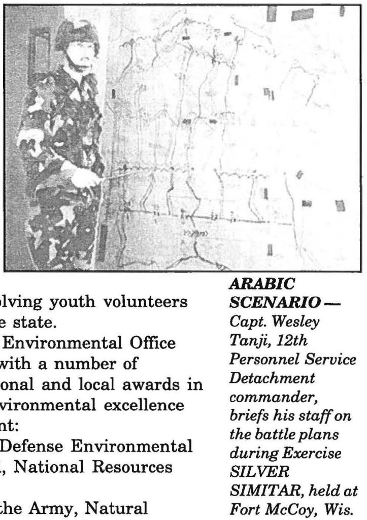 ARABIC SCENAR- Capt. Wesley Tanji, 12th Personnel Service Detachment commander, briefs his staff on the battle plans during Exercise SILVER SIMITAR, held at Fort McCoy, Wis.