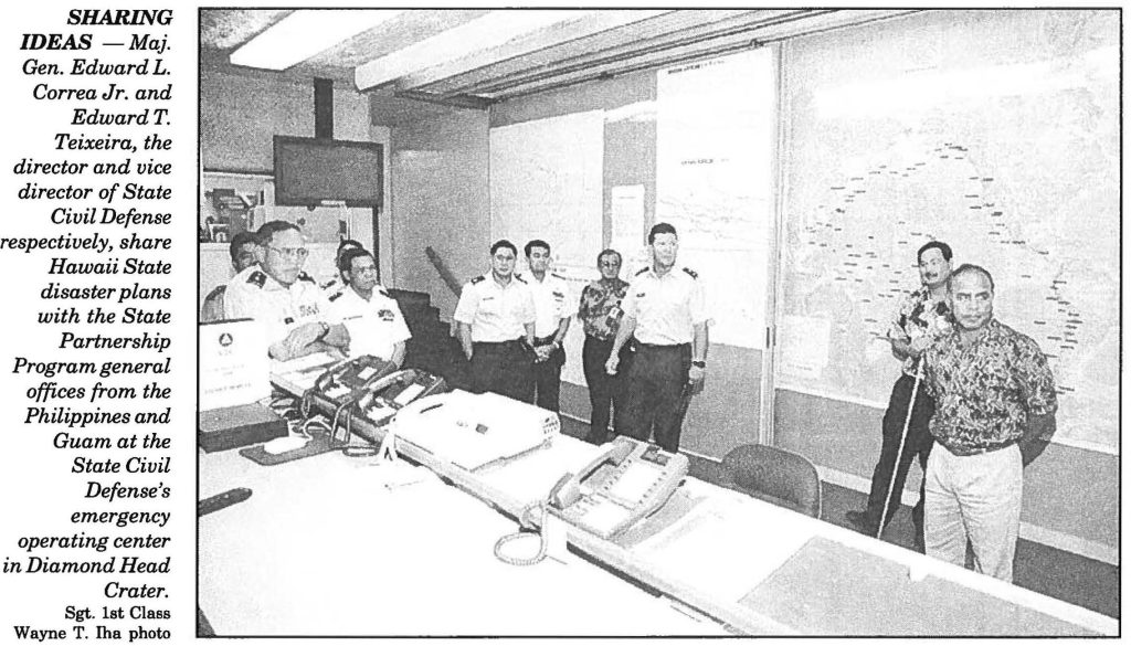 SHARING IDEAS -Maj. Gen. Edward L. Correa Jr. and Edward T. Teixeira, the director and vice director of State Civil Defense respectively, share Hawaii State disaster plans with the State Partnership Program general offices from the Philippines and Guam at the State Civil Defense's emergency operating center in Diamond Head Crater. Sgt. 1st Class Wayne T. Iha photo