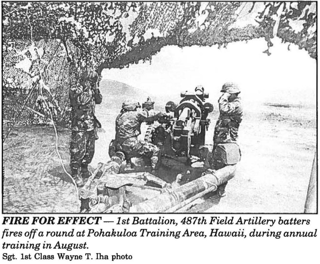 FIRE FOR EFFECT - 1st Battalion, 487th Field Artillery batters fires off a round at Pohakuloa Training Area, Hawaii, during annual training in August. Sgt. 1st Class Wayne T. Iha photo