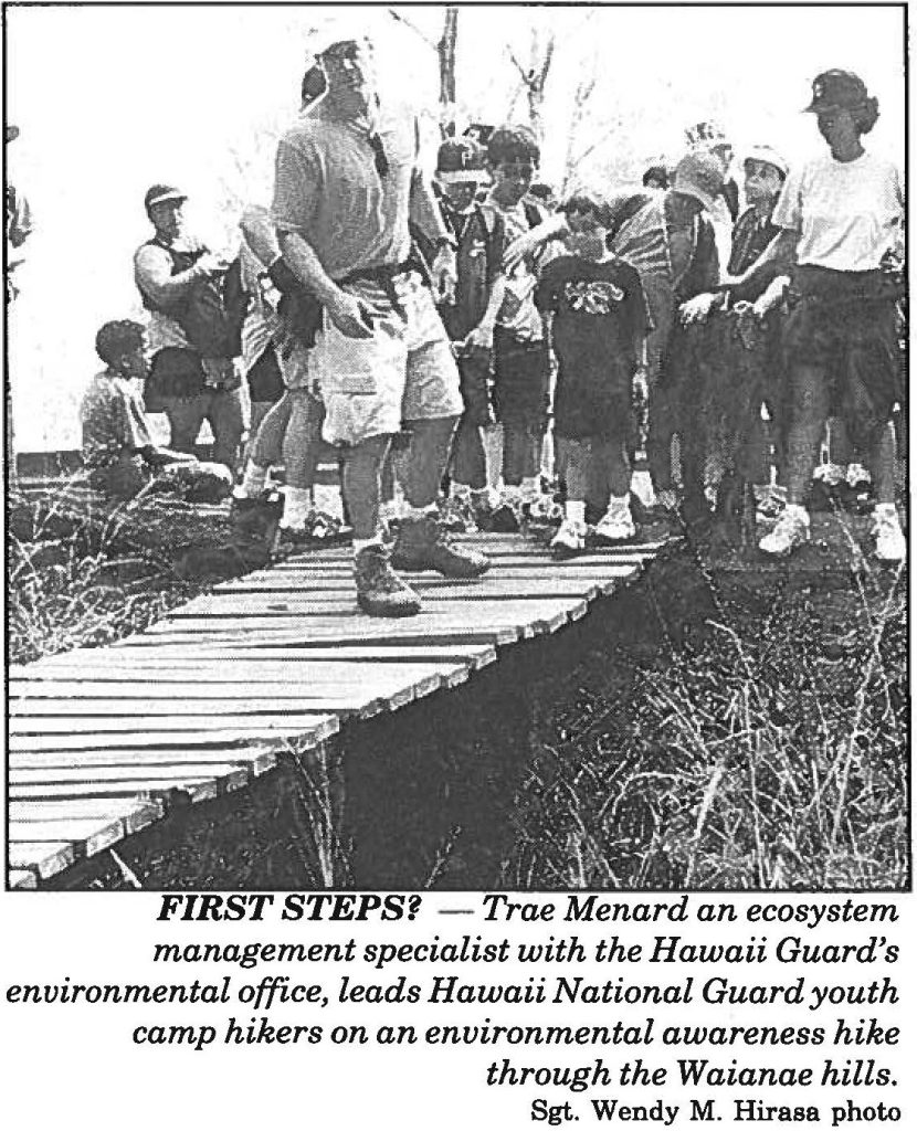 FIRST STEPS? - Trae Menard an ecosystem management specialist with the Hawaii Guard's environmental office, leads Hawaii National Guard youth camp hikers on an environmental awareness hike through the Waianae hills. Sgt. Wendy M. Hirasa photo