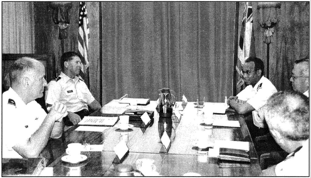 ALL STAR BRIEFING -Lt. Gen. Russell Daivis, National Guard Bureau chief, confers with Maj. Gen. Edward L. Correa Jr., the adjutant general, and his staff in May, 2000. Joining the TAG were Brigadier Generals Myron Dobashi: Hawaii Air National Guard commander; James S. Carpenter, Hawaii Army National Guard commander, and Albert "Putt" Richards, 154th Wing commander. Sgt. 1st Class Stephen M. Lum photo