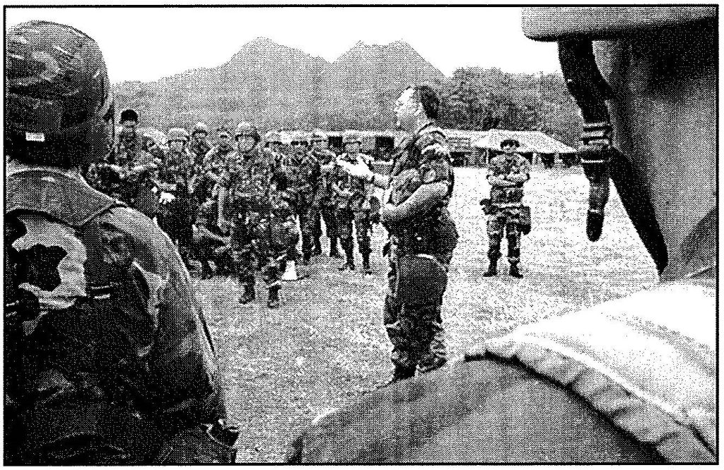 'WE'VE GOT TO DO THIS MORE OFTEN" -Lt. Col. Edwin "Skip" Vincent, 154th Support Group commander, address the unit during a bivouac held in May 2000. Hawaii Air National Guard photo