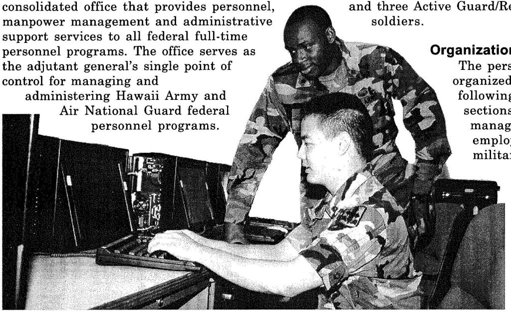 SPECIAL INTELL -Specialists Janal Jones (standing) and Rick Ishii, from the 229th Military Intelligence Company, train on the WARLOARD notebook computer. The computer keeps the unit in sync with the Army s newer intelligence gathering systems. Staff Sgt. Curtis H. Matsushige photo