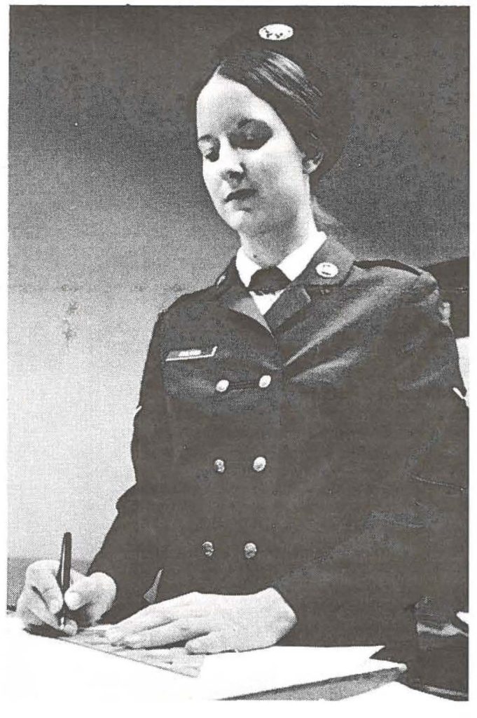 Airman Donna Culman happily at work during a drill weekend with HANG. Donna really feels the Guard and the "guys" in her unit are great.