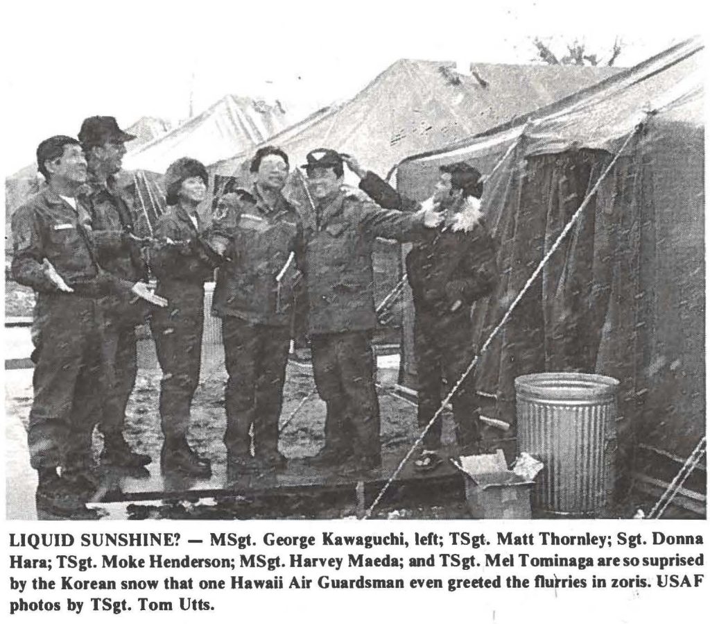 LIQUID SUNSHINE? - MSgt. George Kawaguchi, left; TSgt. Matt Thornley; Sgt. Donna Hara; TSgt. Moke Henderson; MSgt. Harvey Maeda; and TSgt. Mel Tominaga are so suprised by the Korean snow that one Hawaii Air Guardsman even greeted the flurries in zoris. USAF photos by TSgt. Tom Utts.