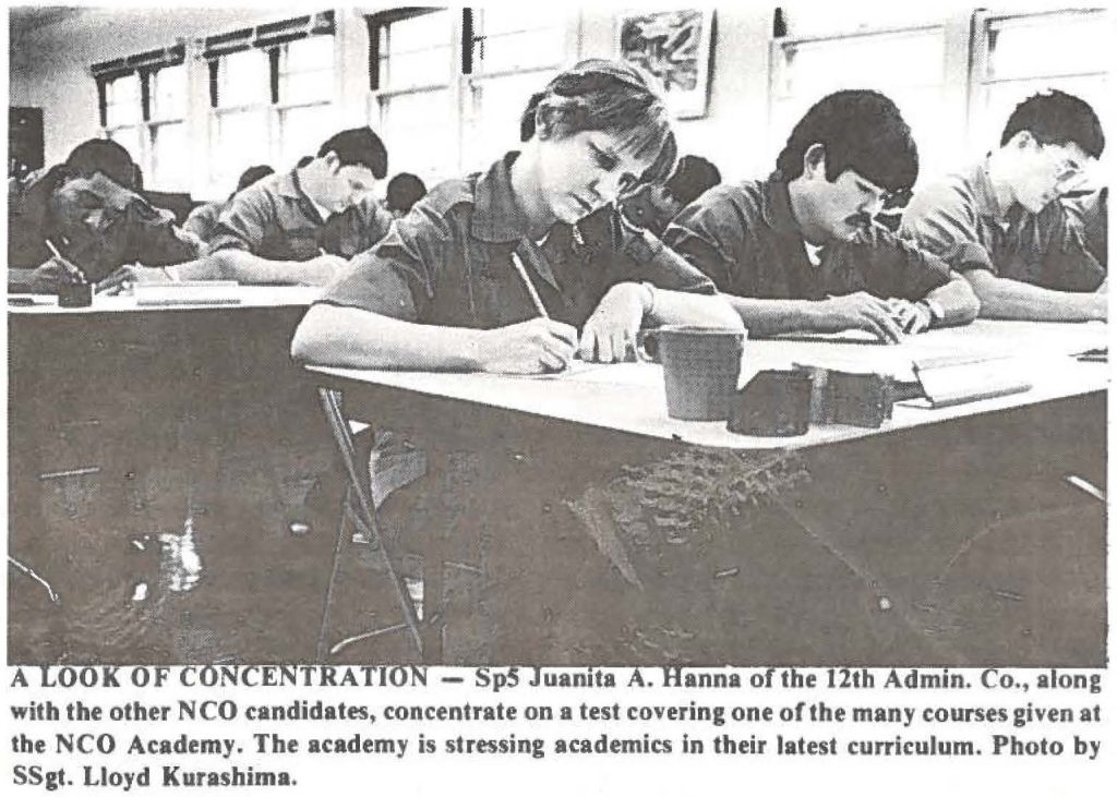 A LOOK OF CONCENTRATION 0 Sp5 Juanita A. Hanna of the 12th Admin. Co., along with the other NCO candidates, concentrate on a test covering one of the many courses given at the NCO Academy. The academy is stressing academics in their latest curriculum. Photo by SSgt. Lloyd Kura