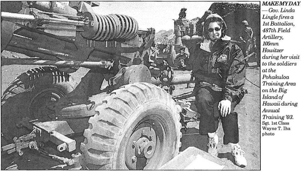 MAKE MY DAY - Gov. Linda Lingle fires a 1st Battalion, 487thField Artillery, 105mm Howitzer during her visit to the soldiers at the Pohakuloa Training Area on the Big Island of Hawaii during Annual Training '03. Sgt. 1st Class Wayne T. Iha photo