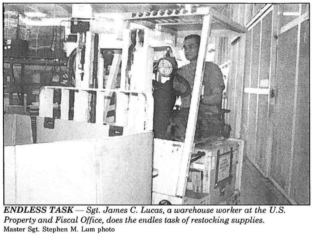 ENDLESS TASK - Sgt. James C. Lucas, a warehouse worker at the U.S. Property and Fiscal Office, does the endless task of restocking supplies. Master Sgt. Stephen M. Lum photo