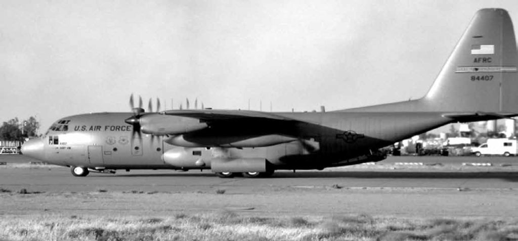 HEAVY LIFTER --A C-130 Hercules from the 204th Airlift Squadron sits on the runway in Balad, Iraq, waiting to transport pallets. Senior Master Sgt. Gordon Lau photo