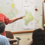 ON THE STOP – Gov. Linda Lingle and Maj. Gen. Robert G.F. Lee go over the earthquake recovery plan in the Hawaii County Emergency Operations Center after the Big Island’s Kiholo Bay 6.7 magnitude quake. Maj. Charles J. Anthony photo