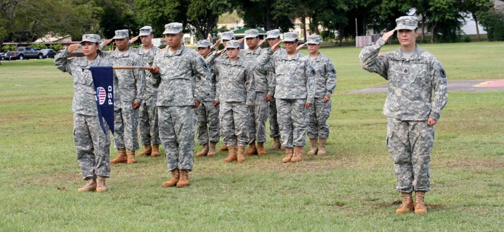 FAREWELL TILL NEXT SUMMER -- Master Sgt. Mara Bacon leads a team of 12th Personnel Service Detachment Soldiers on their way to Iraq and Kuwait in support of Operation IRAQI FREEDOM. Sgt. 1st Class Curtis H. Matsushige photo