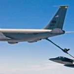 GASING UP – Hawaii Air National Guard’s KC-135R Stratotanker refuel her newest sister, the new incoming F-22 Raptor. Master Sgt. Mark Sindiong photo