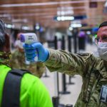 Hawai‘i National Guard conduct medical screenings at Hawai‘i airports during COVID-19 pandemic, Honolulu, HI. Spc. James Kamaka with the 1st Squadron, 299th Cavalry, screens departing passengers at the Daniel K. Inouye International Airport. HING Soldiers assisted airport fire personnel screening 100% of travelers arriving and departing to the State of Hawai‘i. (Photo by: Sgt. John Schoebel)