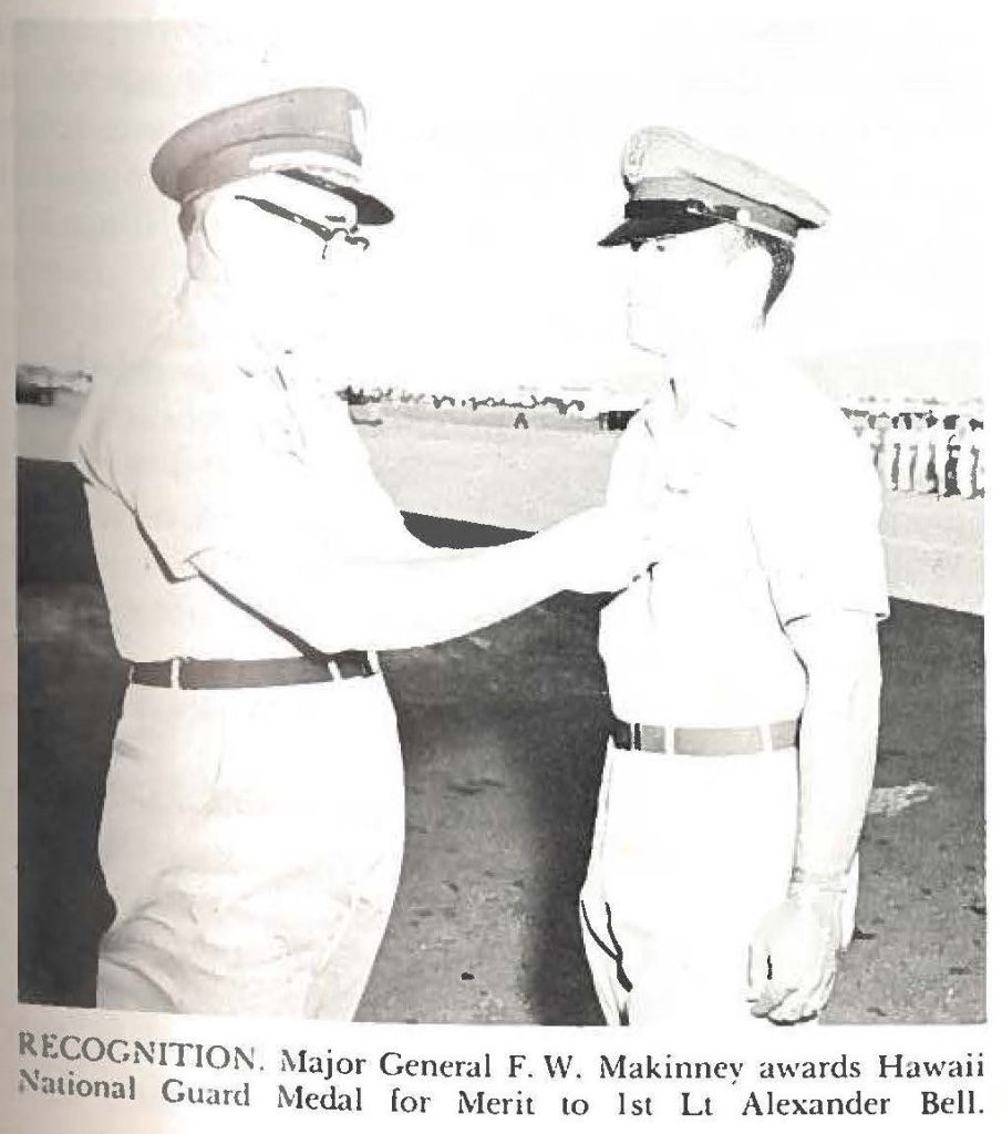 RECOGNITION. Major General F. W. Makinney awards Hawaii National Guard Medal for Merit to 1st Lt Alexander Bell.