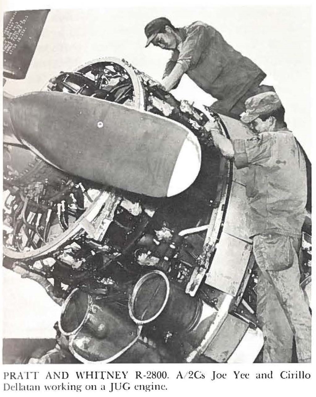 PRATT AND WHITNEY R-2800. A/2Cs Joe Yee and Cirillo Dellatan working on a JUG engine.