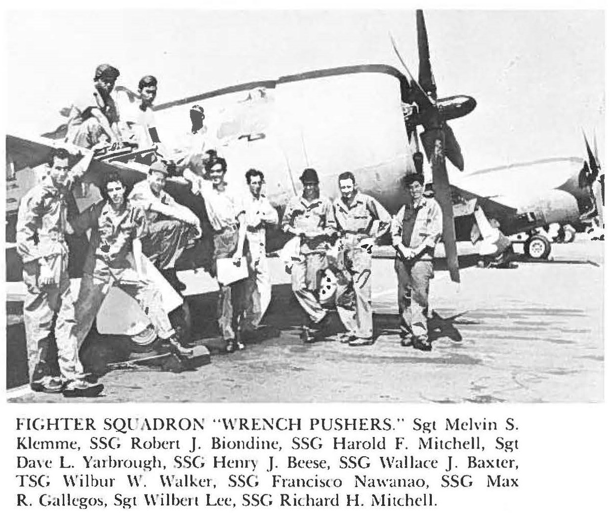 FIGHTER SQUADRON "WRENCH PUSHERS." Sgt Melvin S. Klemme, SSG Robert J. Biondine, SSG Harold F. Mitchell, Sgt Dave L. Yarbrough, SSG Henry J. Beese, SSG Wallace J. Baxter, TSG Wilbur W. Walker, SSG Francisco Nawanao, SSC Max R. Gallegos, Sgt Wilbert Lee, SSC Richard H. Mitchell