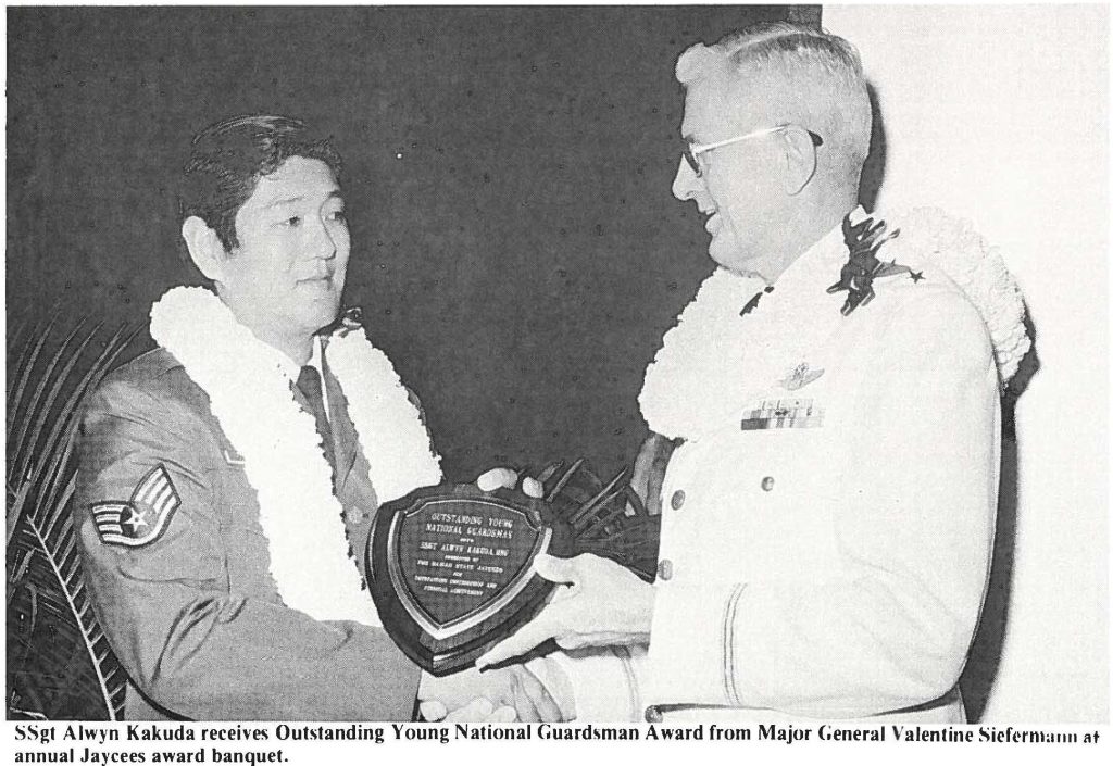 SSgt Alwyn Kakuda receives Outstanding Young National Guardsman Award from Major General Valentine Siefermann at annual Jaycees award banquet.