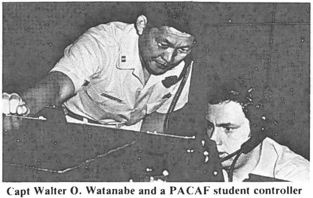 Capt Walter O. Watanabe and a PACAF student controller