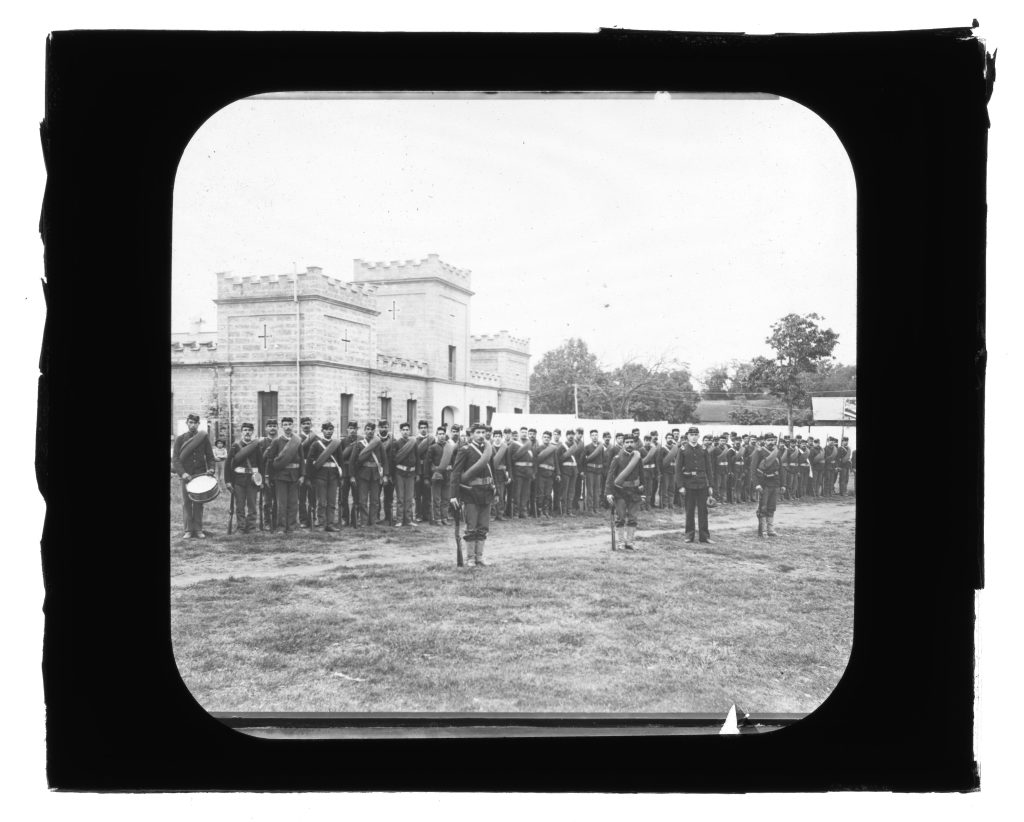 1890s. NATIONAL GUARD - Unidentified men. Front of Iolani Barracks