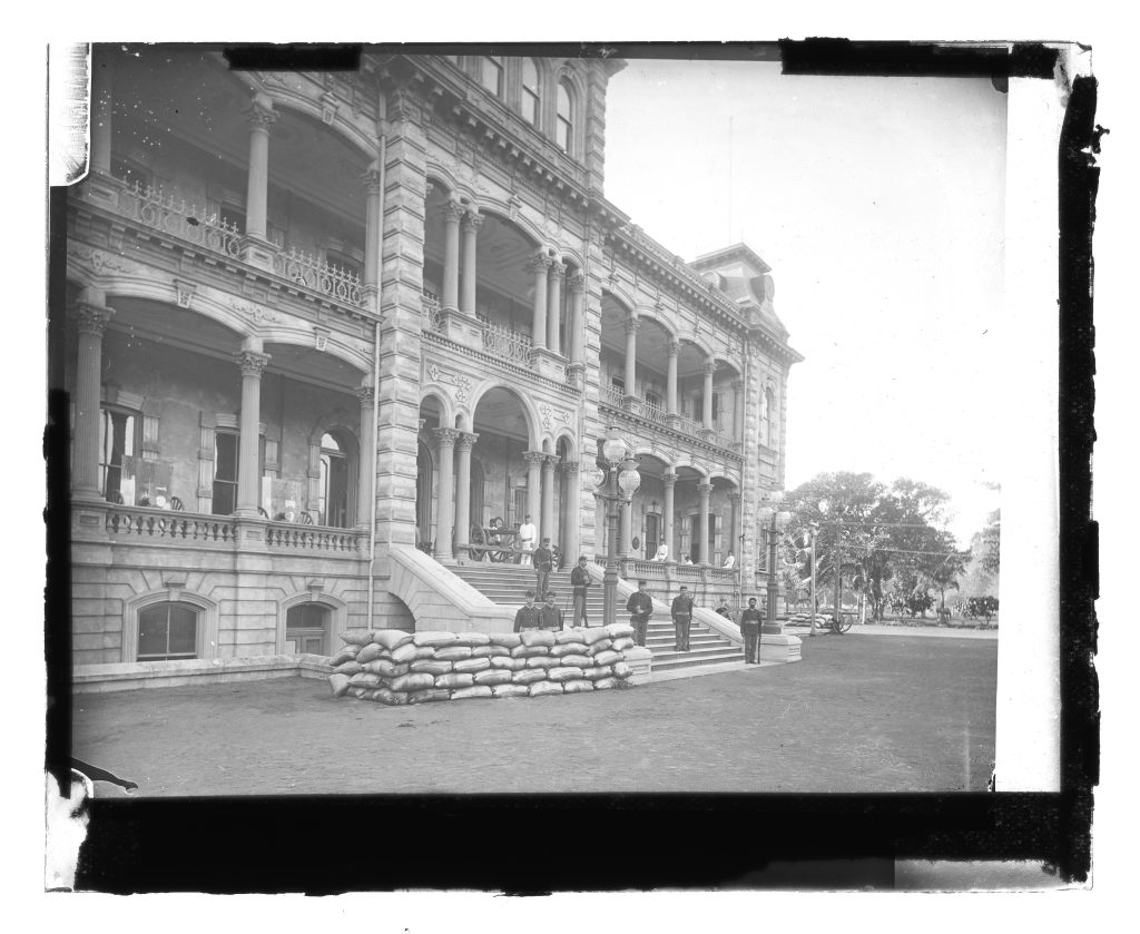 1890s. NATIONAL GUARD - Unidentified men. Guard at the front of Iolani Palace