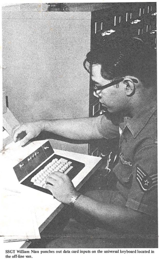 SSGT William Niau punches out data card inputs on the universal keyboard located in the off-line van.