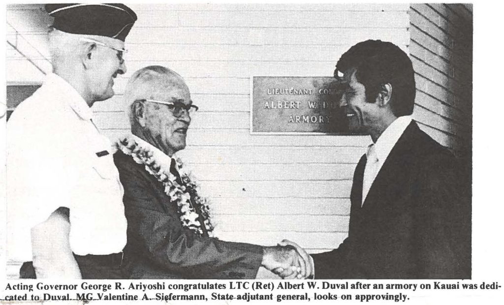 Acting Governor George R. Ariyoshi congratulates L TC (Ret) Albert W. Duval after an armory on Kauai was dedicated to Duval MG Valentine A. Siefermann, State adjutant general, looks on approvingly.