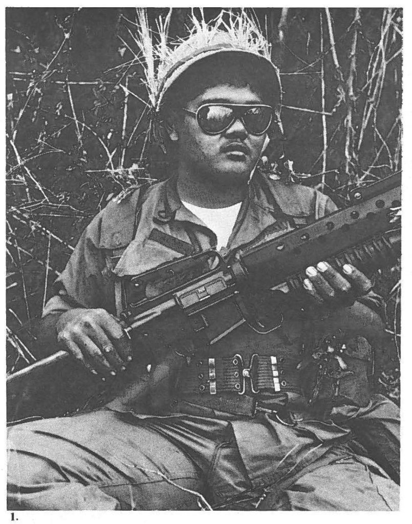 With Apologies to Jim Croce . .. "you don't tug on Superman's cape; you don't spit into the wind; you don't pull the mask off the ol" Lone Ranger and you don't mess around with ... " PFC Tony Acpal - 1st Bn, 299th Inf - shown here complete with glasses and grenade launcher.