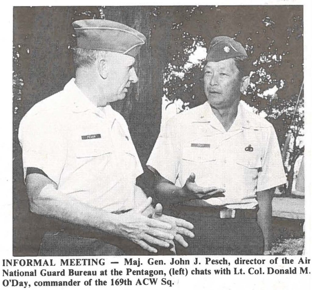 INFORMAL MEETING - Maj. Gen. John J. Pesch, director of the Air National Guard Bureau at the Pentagon, (left) chats with Lt. Col. Donald M. O'Day, commander of the 169th ACW Sq.