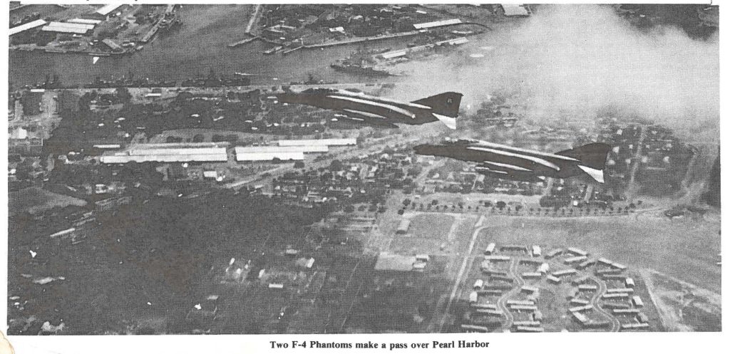 Two F-4 Phantoms make a pass over Pearl Harbor