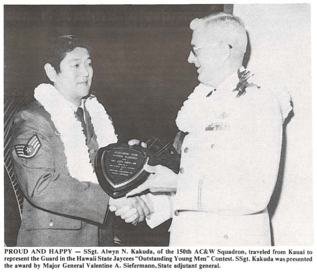 PROUD AND HAPPY - SSgt. Alwyn N. Kakuda, of the 150th AC&W Squadron, traveled from Kauai to represent the Guard in the Hawaii State Jaycees "Outstanding Young Men" Contest. SSgt. Kakuda was presented the award by Major General Valentine A. Siefermann, State adjutant general.